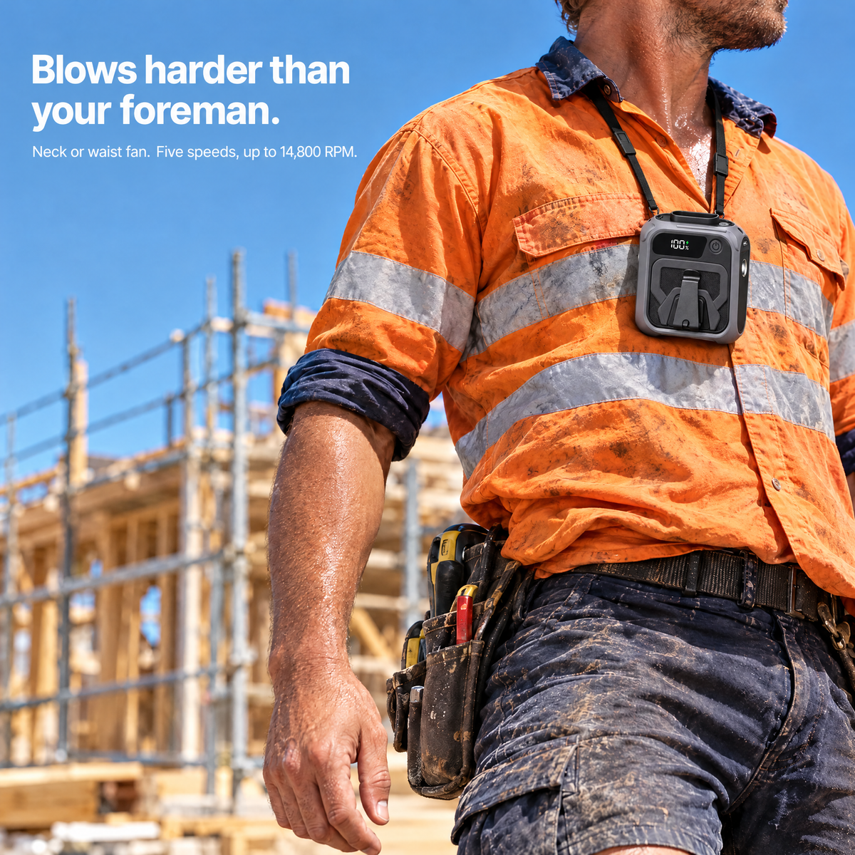 Tradie on an Australian building site wearing the Blow Me Classic portable fan on a neck lanyard