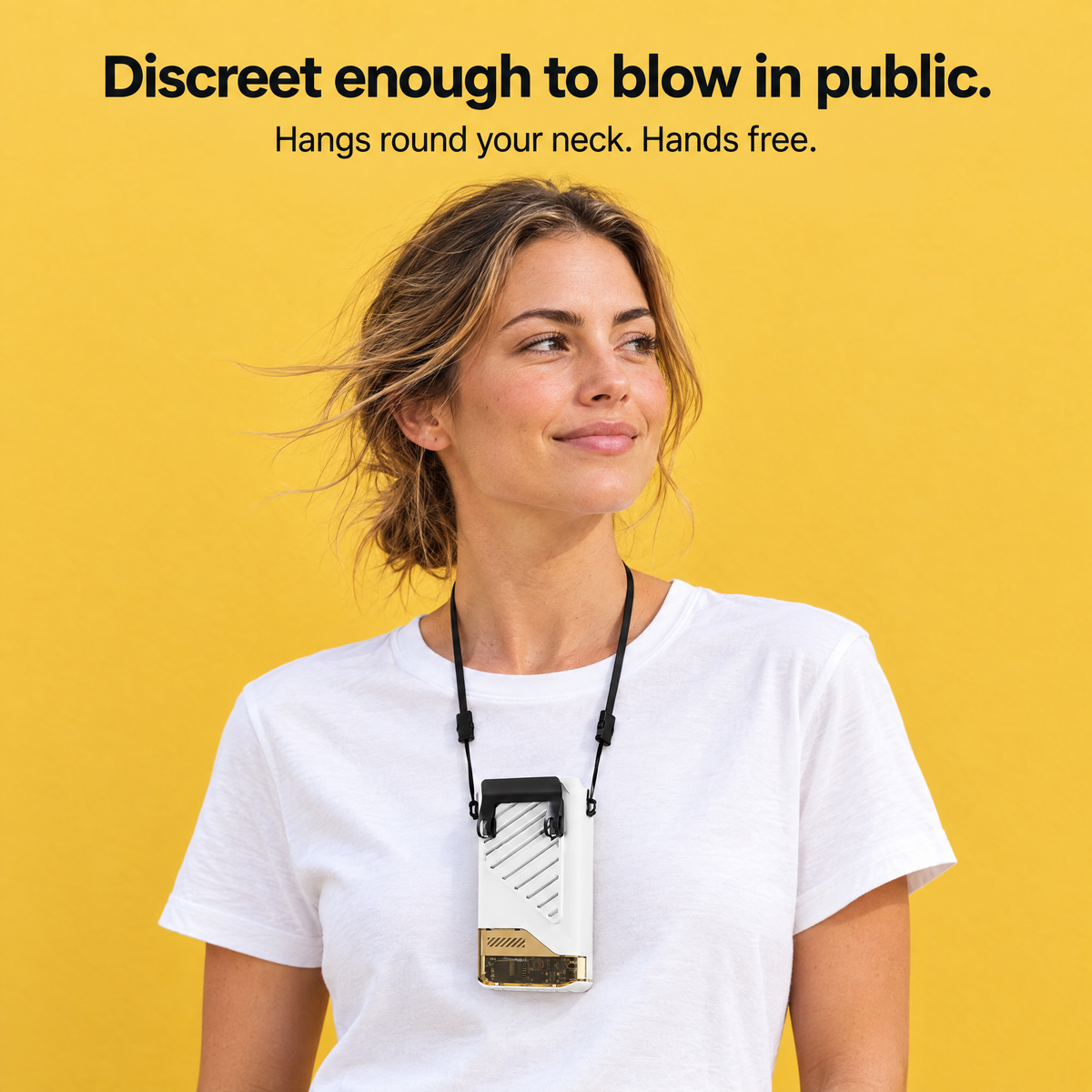Woman wearing the white Blow Me Mini neck fan on a lanyard